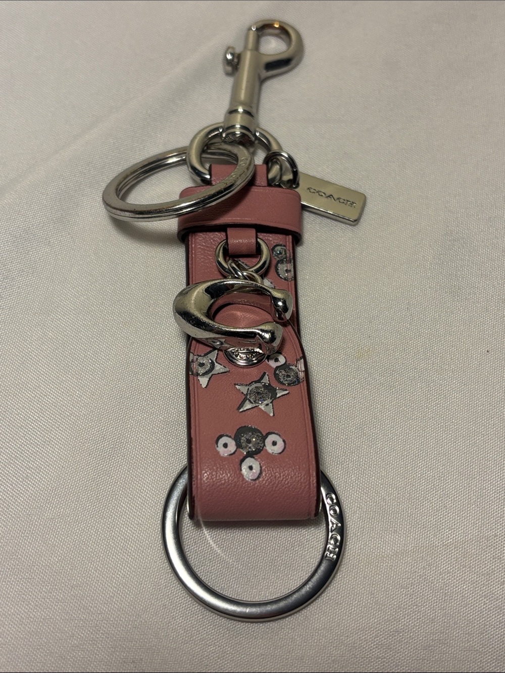 Coach Pink Leather Key Fob with Silver Hardware and Star Studs